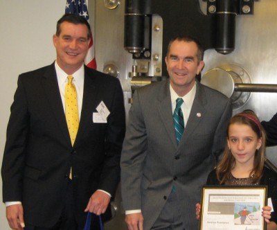 from left Dr. Epps, Lr Govenor Northam and wining child of use a helmet prevent epilepsy