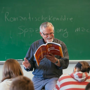 Don Clymer, here teaching a German course, has taught several languages at Eastern Mennonite University for 17 years, as well as five years as an adjunct. He also spent five years as director of cross-cultural programs at EMU. He'll be recognized with fellow retiring faculty Spencer Cowles and Ted Grimsrud at a May 3 reception at 4 p.m. in the campus center greeting hall. (Photo by Joaquin Sosa)