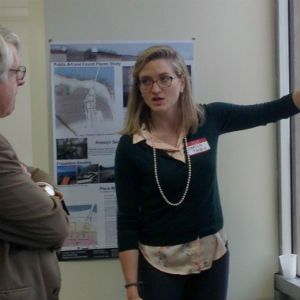 Graduate student Carlin Tacey presents her design for making the Rosslyn waterfront more inviting to the community.