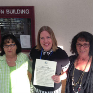 Virginia Graham, Crystal Abbe Graham and Donna Bailey accept the National Suicide Prevention Week proclamation from the Augusta County Board of Supervisors.