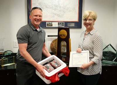 Chamber gives Texas steaks to behind-the-scenes player for UVA Basketball program