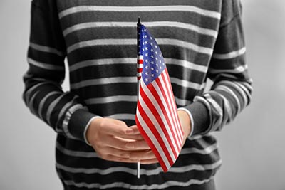 woman holding American flag