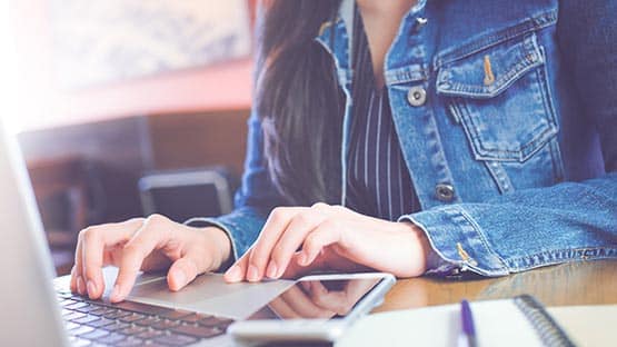 teen on laptop