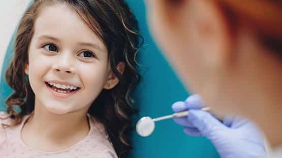 child at dentist office