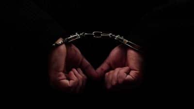 handcuffs arrest police hands guilty jail