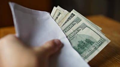 cash bribe in envelope