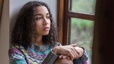 teen girl mental health depression sad window