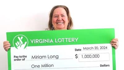 Virginia lottery winner Miriam Long with check
