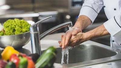 norovirus spread stomach bug flu chef washing hands