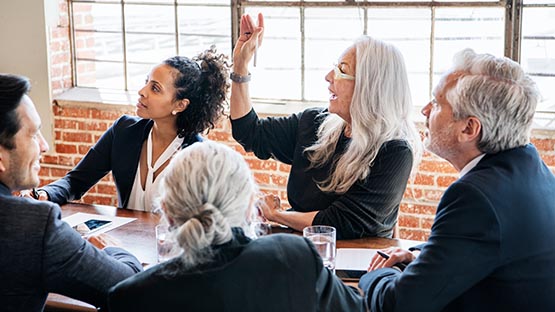 board of directors meeting raising hand