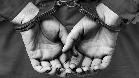 woman arrest handcuffs