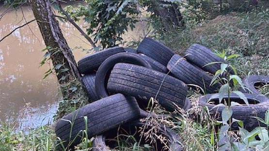 used tired illegal dumping middle river ACSO