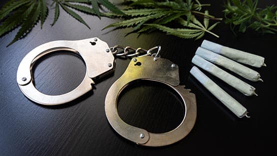 marijuana joint handcuffs arrest weed drug
