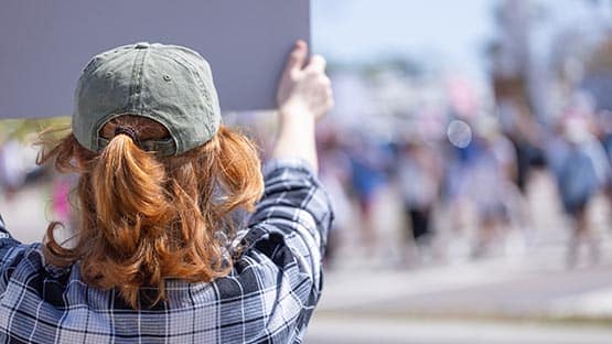 Free America Walkout : Group protests anniversary of Trump return