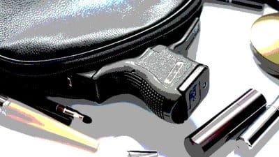 purse gun suspect firearm