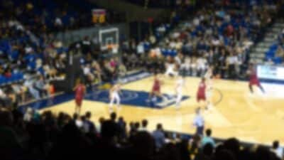 college basketball arena blurred