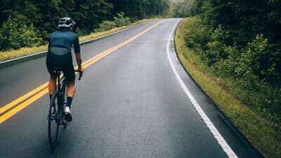 cyclist on wet road