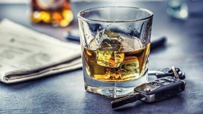 DUI driving under influence whiskey bar car keys