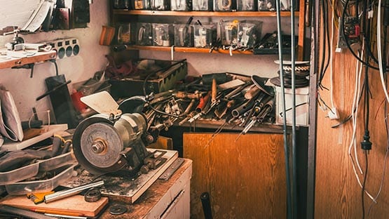 cluttered garage messy shop tools cabinet workshop